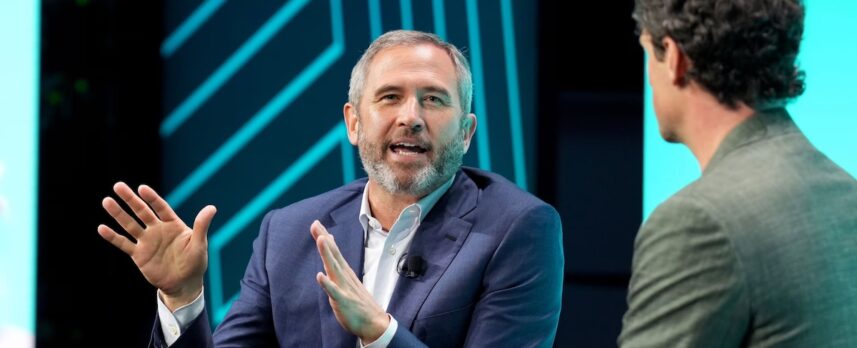 Brad Garlinghouse, CEO of Ripple, speaks at Consensus 2024. (Shutterstock/CoinDesk)